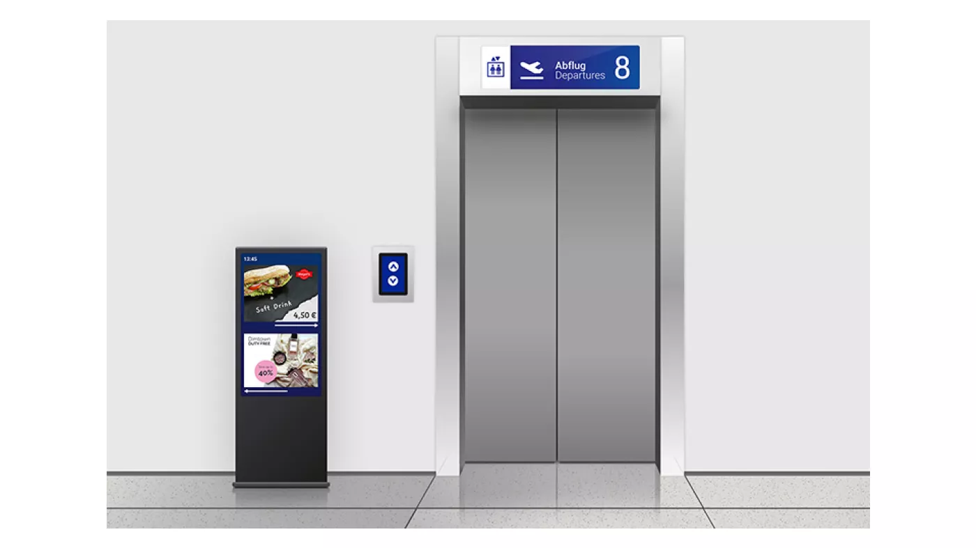 multimedia display in an airport elevator